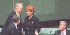 Pauline Hanson is congratulated after her maiden speech by fellow Independents.