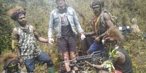 Papuan separatist rebels with New Zealander pilot Phillip Mark Mehrtens,who they took hostage in early February.
