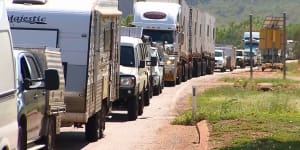 Hundreds of cars line up at the WA-NT border. 