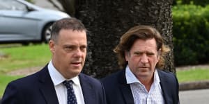 Former Manly Sea Eagles coach Des Hasler arrives at the coroners court for the Keith Titmuss inquest on Friday.