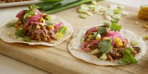 Succulent palate-pleaser:Slow-cooked pulled pork,served on tortillas.