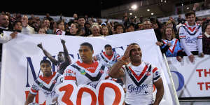 Michael Jennings in front of a banner celebrating his 300th NRL game at McDonald Jones Stadium.