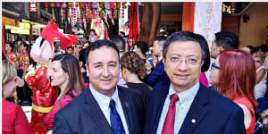Labor MLC Shaoquett Moselmane with former staffer John Zhang,right.