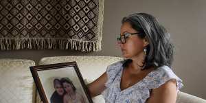 Lorena Bestrin holds a picture of herself and her son Amaru,who died of a heroin overdose in Liverpool Hospital in December 2016.