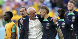 Graham Arnold and Riley McGree after the final whistle.