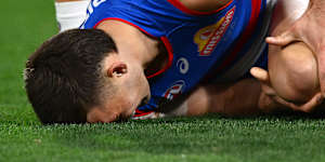 Sam Darcy in agony after rupturing his ACL.