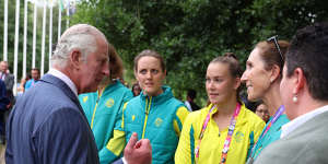 Prince Charles meets with athletes and members of the Australia team as he visits the athletes’ village.