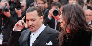 Johnny Depp and actor-director Maiwenn on the red carpet.