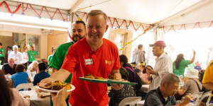 Labor leader Anthony Albanese volunteers at the Exodus Foundation in his electorate on Christmas Day,2019.