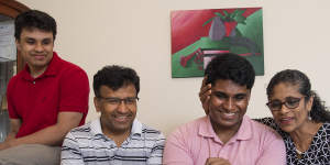 Thinesshan Thevathasan receives his ATAR results with his brother Amerthan,father Nadarajah and mother Sivakumari.