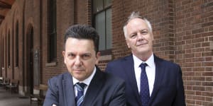 Former independent Senator Nick Xenophon and his law partner,former ABC foreign correspondent Mark Davis,outside the Supreme Court in Sydney.