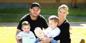 Shaun and Belinda Hedley with their twin sons Seth and Braith and a CPR kit in 2009.