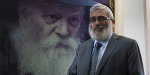 Then rich-lister Rabbi Joseph Gutnick in his Melbourne office in 2013. Behind him is a portrait of the Lubavitcher Rebbe,Menachem Mendel Schneerson.