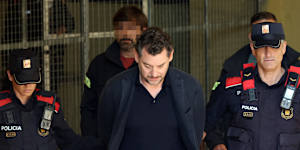 Son of billionaire fashion tycoon arrested as suspect in father’s hiking death