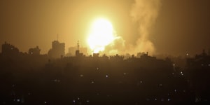 An explosion is caused by Israeli airstrikes on a Hamas military base in town of Khan Younis,southern Gaza Strip,on Tuesday.