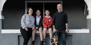 Neil and Jackie Blum with their kids Alfie,Charlie and dog Coco outside their recently sold home in Mascot on 27 July,2022. 