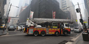 Firefighters attend scores of call outs at buildings across the city after the smoke triggered fire alarms. 