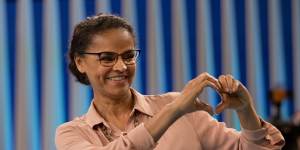 Marina Silva,presidential candidate of the Sustainability Network Party,gestures to the audience before a live,televised presidential debate last week.