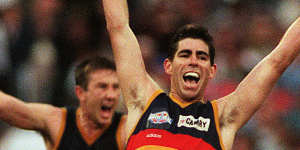 Darren Jarman was an AFL superstar in the 1990s,first with Hawthorn,then with Adelaide.