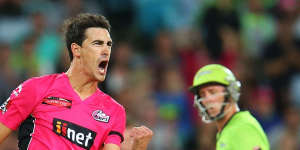 Hitting back:Mitchell Starc celebrates after uprooting Jacques Kallis's stumps during the BBL match at ANZ Stadium on Saturday night.