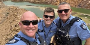 Sergeant Dan Major (centre) with Meekathara officers Constable Hemmings and Sergeant Davy.