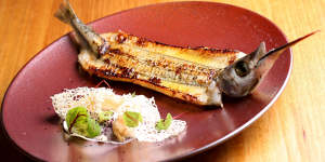A butterflied garfish entree is dramatically presented.