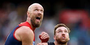 Max Gawn of the Demons and Noah Balta of the Tigers compete.