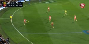 Space to roam:While Ben Keays and three Crows teammates celebrate what they thought was a goal,the Swans kick the ball to the opposite pocket where they have a numbers advantage.