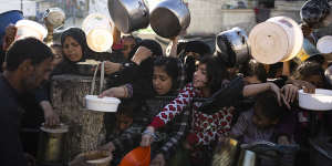 Palestinians are fleeing devastation in Gaza,including dire food shortages. 