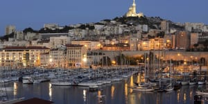 Marseille harbor with its famous Notre Dame church,France.
