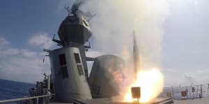 HMAS Toowoomba fires a missile during exercises in the Pacific in 2018.