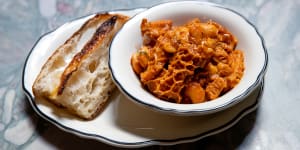 Trippa alla Fiorentina,with honeycomb tripe richly sauced in tomato sugo studded with big fat white beans.