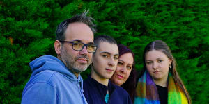 Chris (left) and Stephanie (second from right) Hindson,with son Jacob Peck (second from left) and daughter Lillian Hindson-Peck. Their family has noticed the steep increase in education expenses.