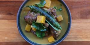 Duck leg with sour curry and pumpkin. 