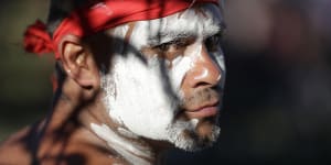 Russell Dawson of the Koomurri Aboriginal Dancers participates in a smoking ceremony during last year’s Australia Day ceremonies in Sydney. 