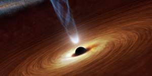 An artist's illustration of a supermassive black hole,with a spinning jet of matter shooting out.