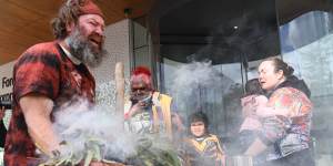 A smoking ceremony is held at the NSW Coroners Court in July 2022 during the inquest for Mootijah Shillingsworth,who died from an ear infection.