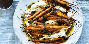 Brown butter and citrus roasted carrots on a bed of labna.