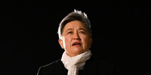 Penny Wong speaking to media after arriving in Beijing.