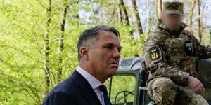 Defence Minister Richard Marles visits Ukrainian troops outside Lviv,near the Polish border,in April.