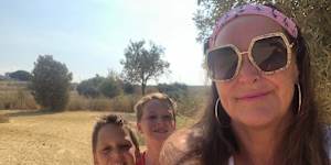 Kate Langbroek with her two sons,who “love to make a difference”.