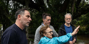 NSW Premier Chris Minns,Minister for Emergency Services Jihad Dib and Lismore MP Janelle Saffin joined nervous Lismore residents to watch the river rise at the Browns Creek pumping station earlier today.