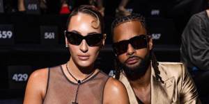 Alyssa and Patty Mills take their front-row seats at Dolce&Gabbana’s Milan fashion show this week.