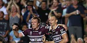 Tom Trbojevic celebrates one of his tries with brother Jake.