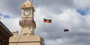Flags flying over Richmond Town Hall,where Yarra Council took its controversial vote. 