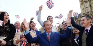Nigel Farage and his supporters celebrate their victory in the EU referendum. 