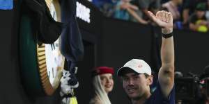 Alex de Minaur soaks up the love from the Melbourne Park crowd after his fourth round win.