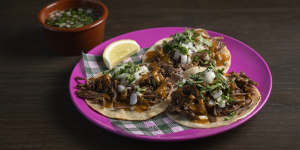 Barbacoa estilo Hidalgo (lamb barbacoa tacos with chilli consommé).