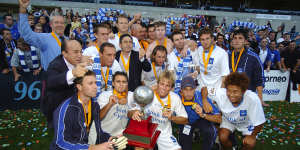 The Olympic Sharks,as they were then known,celebrate their 2002 NSL grand final win over Perth Glory.