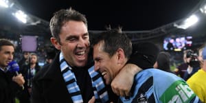NSW coach Brad Fittler congratulates his much-maligned halfback Mitchell Pearce.